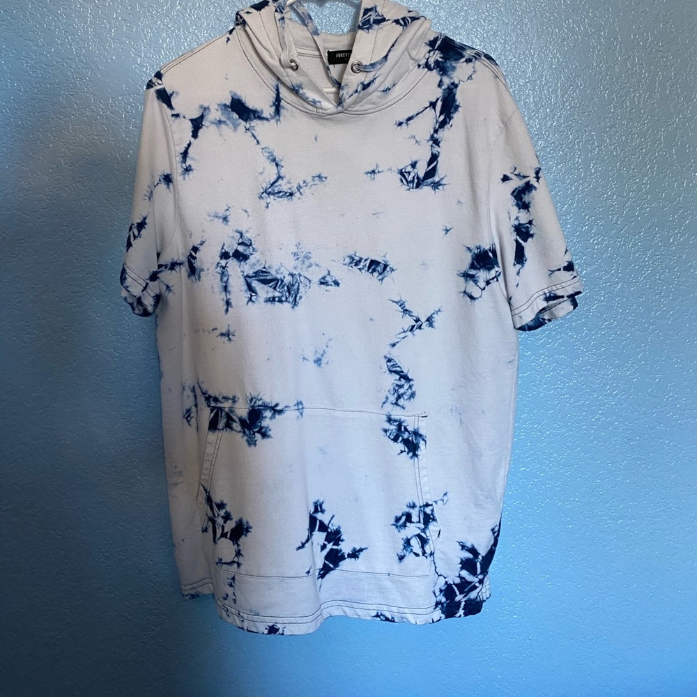 A blue and white shirt with hoodie